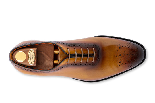 Stringata in pelle dipinta a mano