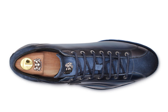 Zapatillas de cuero pintadas a mano azul