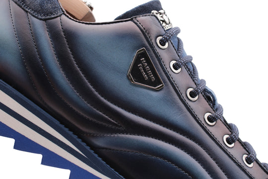 Zapatillas de cuero pintadas a mano azul