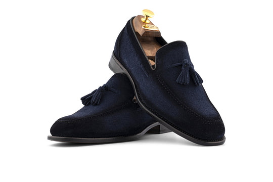 Mocasín con pompón en ante decolorado a mano