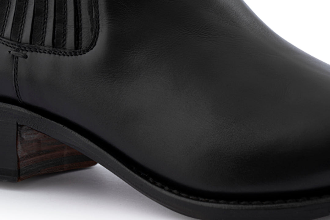 Botín tejano de piel con elástico