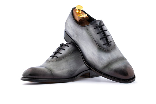 Francesina dipinta a mano con cuciture su carne