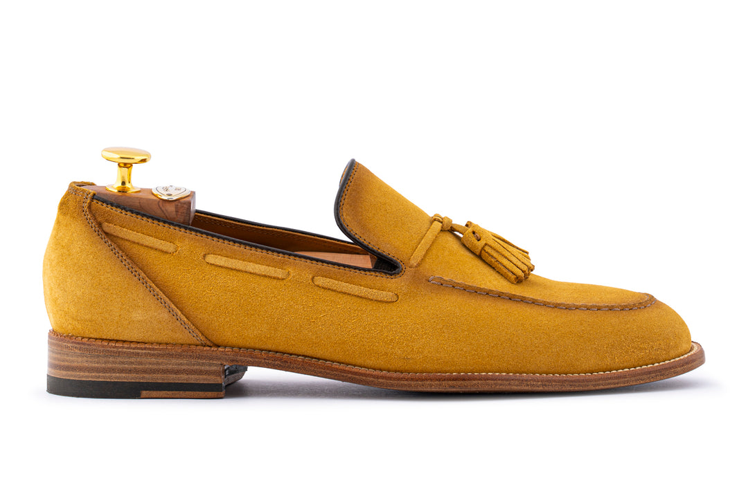 Mocassino in suede con pon pon