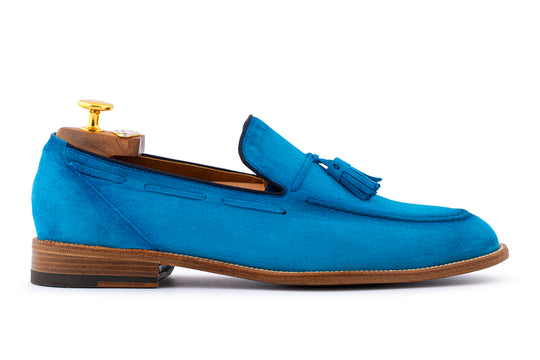 Mocassino in suede con pon pon