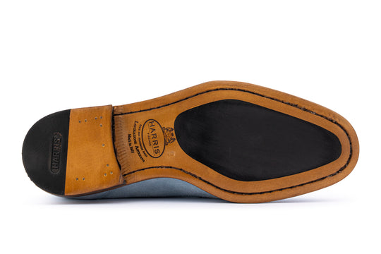 Mocassino in suede con pon pon