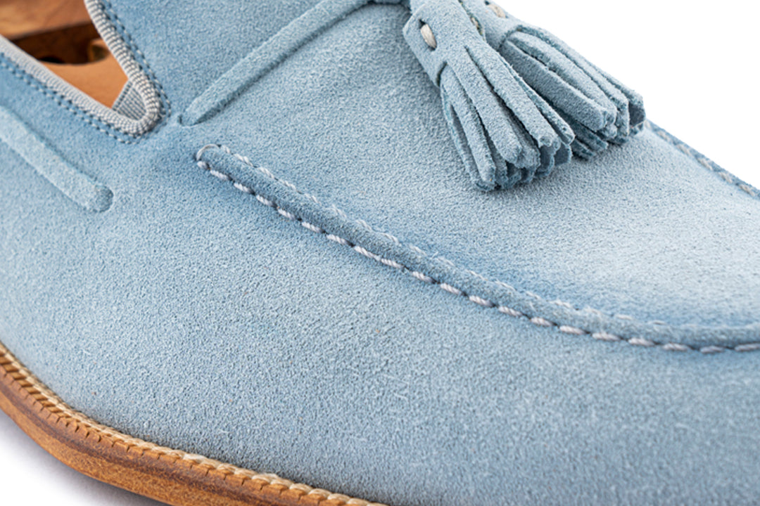 Mocassino in suede con pon pon