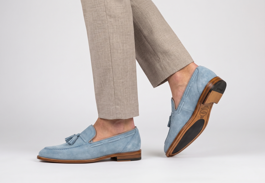 Mocassino in suede con pon pon