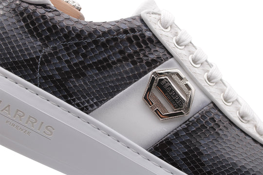 Sneakers in pelle di pitone e suola a cassetta